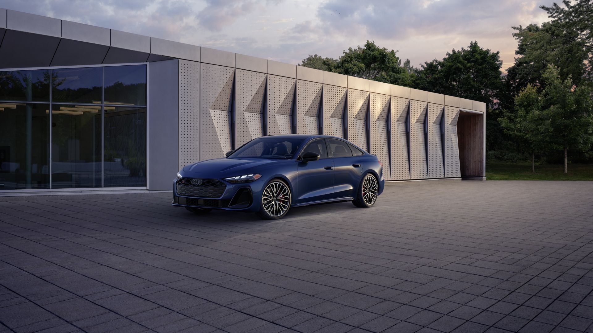 Right profile view of an Audi S5 parked.